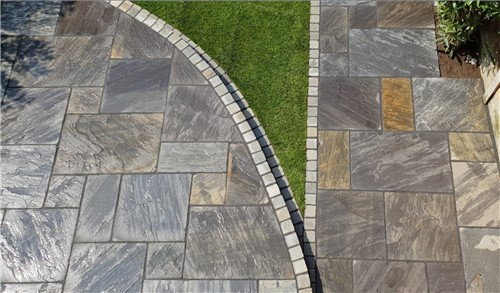 The black colouring shines through in the Sagar, when this blend of paving is wet.  This clever mix offers a mix of black and grey paving slabs but with a unique cream and brown natural textured veining.