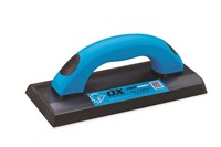  The OX Grout Float comes with a soft-grip cushioned handle that is contoured. This reduces any fatigue or discomfort to your hand while using the tool and is also equipped with a thick gum rubber black pad along with a 3/4th inch foam rubber core which ensures smooth application.  The OX Grout Float has 2 rounded corners for even application in grout joints. The OX Grout Float has 2 square corners which ensures complete grout coverage in corners.  The OX Grout Float comes with a thick plastic backing plate that is attached along with the cushion. This resists the float from bending and provides even pressure across the surface.